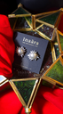 أقراط مسمارية بتصميم أشعة الشمس مع لؤلؤ