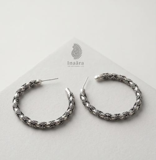 oxidized silver hoop earrings.
